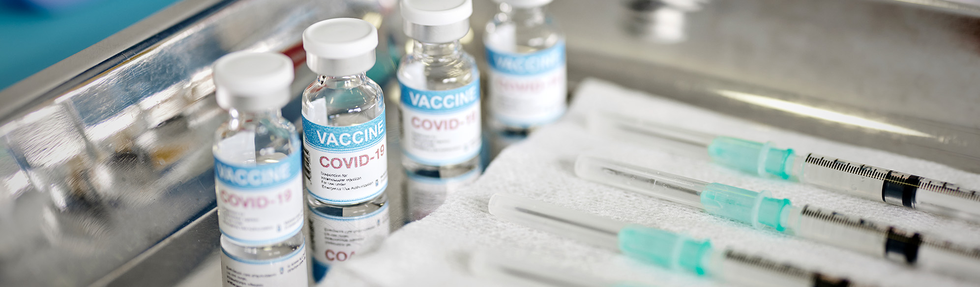 Photo: Image of COVID-19 vaccines and supplies